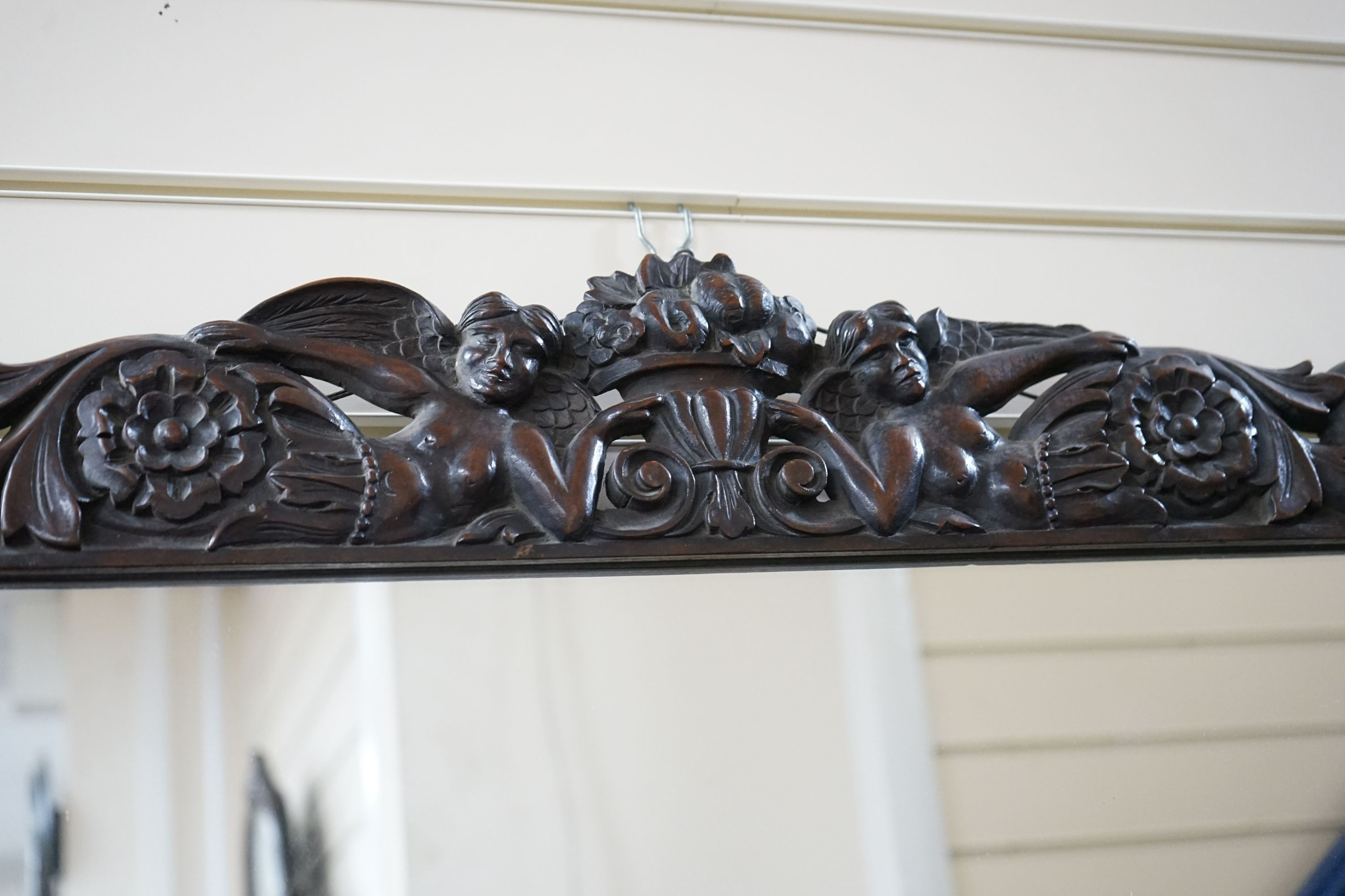 An 18th century style carved walnut rectangular wall mirror, width 84cm, height 56cm